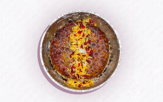 ته چین سبزی پلو با گوشت گوسفندی